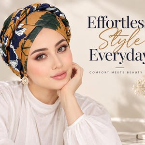 May include: A mustard yellow turban featuring a dark green and white floral pattern with a braided top detail. The text "Effortless Style Everyday" and "COMFORT MEETS BEAUTY" is printed in dark blue and script font on the right side of the image.