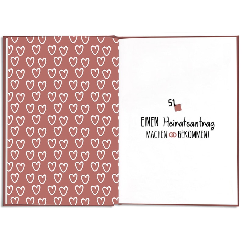 May include: Open book with a red cover. The left page has a pattern of white hearts on a red background. The right page has the number 51, and German text that translates to "Make a proposal, get married!"