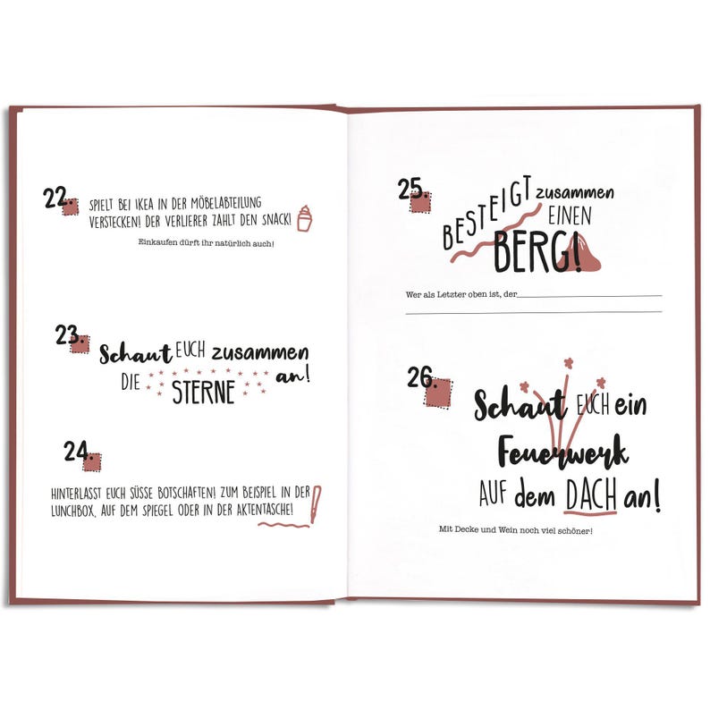 May include: Open notebook pages with German text and illustrations. One page has text about playing hide-and-seek at IKEA. Another page has text about climbing a mountain and watching fireworks.