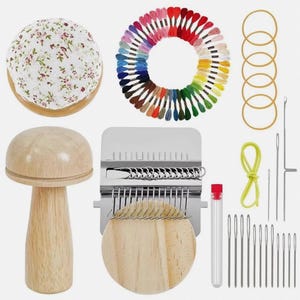 May include: A darning kit featuring a wooden mushroom tool, a floral fabric pincushion, a metal weaving loom, a circular arrangement of multi-coloured embroidery threads, five rubber bands, a yellow cord, a clear needle tube, and twelve sewing needles.