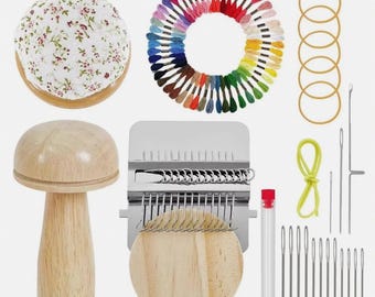 May include: A darning kit featuring a wooden mushroom tool, a floral fabric pincushion, a metal weaving loom, a circular arrangement of multi-colored embroidery threads, five rubber bands, a yellow cord, a clear needle tube, and twelve sewing needles.