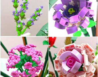 May include: A collage of four different flowers made from colorful plastic building blocks. The flowers include lavender, a purple flower, a pink flower, and a light pink rose. The stems and leaves are green.