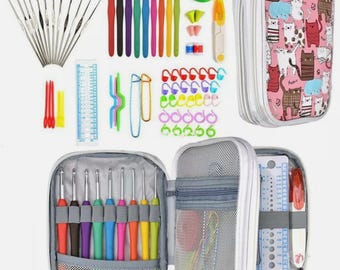 May include: A crochet kit with various tools, including crochet hooks with colorful handles, stitch markers, a measuring tape, and a case with a cat pattern. The kit includes a variety of crochet hooks and accessories.