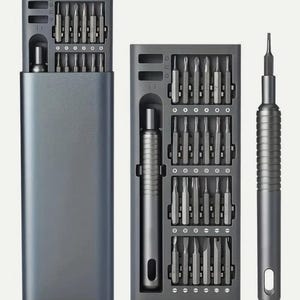 May include: A grey screwdriver set with various bits and a magnetic handle. The set includes a storage case and a separate screwdriver handle. The bits are arranged in rows within the case, and the handle has a textured grip.