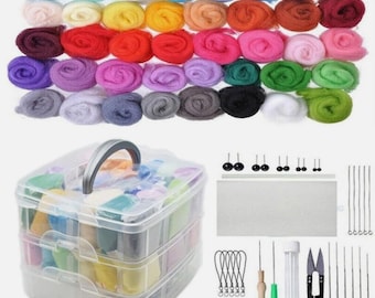 May include: A craft kit with a variety of colorful wool roving, a clear plastic storage container, and various tools. The wool roving is arranged in rows of blues, greens, yellows, reds, pinks, purples, grays, and black. The kit includes needles, scissors, and finger protectors.