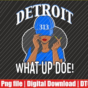 May include: Digital graphic featuring a woman in a blue cap with "313" on it, and the word "DETROIT" above her. The phrase "WHAT UP DOE!" is below the woman. The background is black with diagonal white lines.