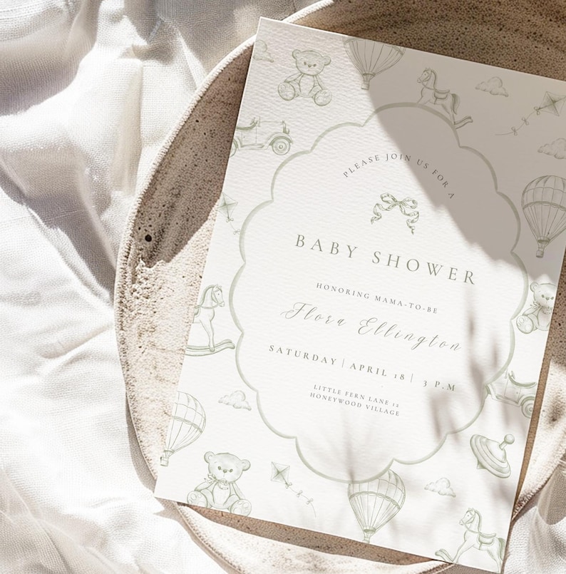 May include: A baby shower invitation with a scalloped edge, decorated with pale green illustrations of toys such as teddy bears and rocking horses. The invitation text includes "Baby Shower", the honoree's name, date, time, and location.