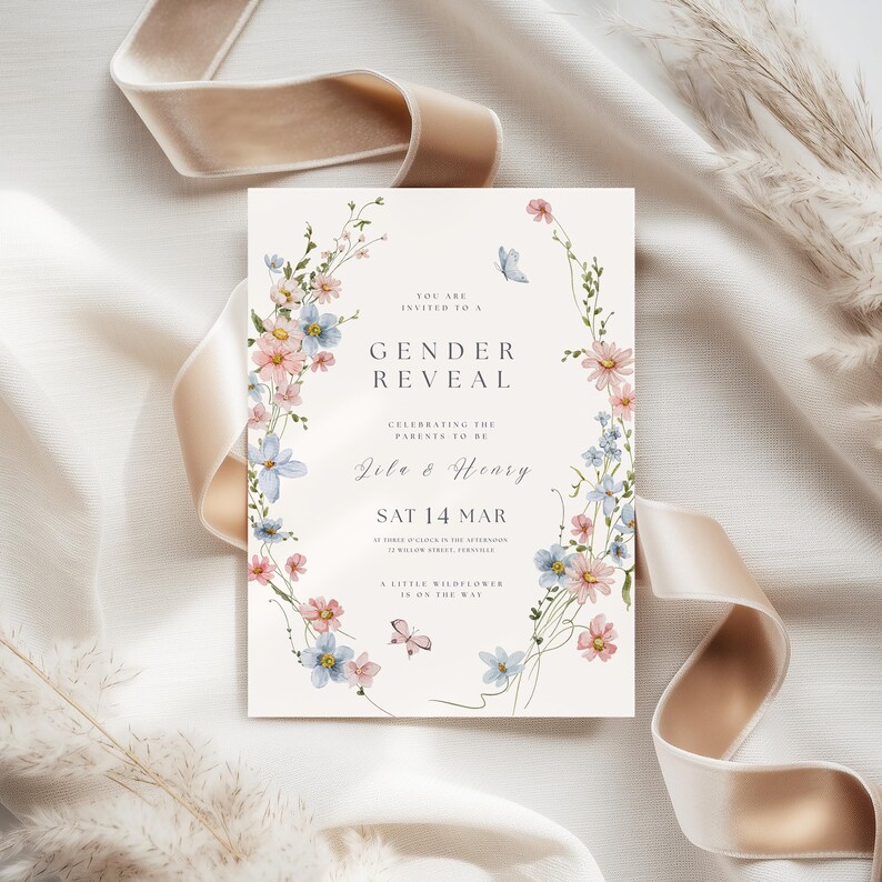 May include: A rectangular gender reveal invitation card featuring a watercolor floral border of pink and blue wildflowers, two small butterflies, and centered text reading "You are invited to a gender reveal" for Lila and Henry on Saturday, March 14.