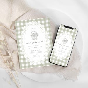 May include: A bridal shower invitation and a smartphone displaying the same design. The invitation and phone screen feature a gingham pattern in light green and white, with a floral basket illustration and the text "Fresh off the market."