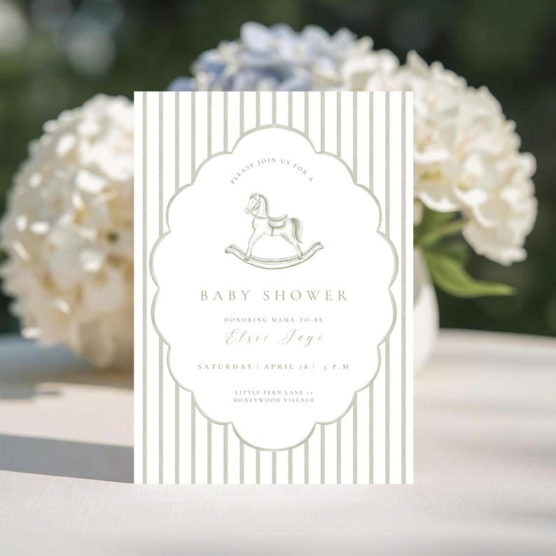 Celebrate the mama-to-be with this elegant vintage green baby shower invitation. Featuring a delicate watercolor rocking horse framed in a soft scalloped shape with classic green stripes, this timeless design brings a refined and traditional charm to your celebration.
Perfect for a classic baby shower theme, this editable Canva template offers a graceful, heirloom-inspired look that feels both sophisticated and sweet.