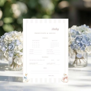 May include: A baby shower prediction and advice card with a striped background. The card includes sections for predictions about the baby's birth month, birth day, gender, height, weight, eye color, hair color, and time of birth. Two watercolor geese are at the bottom.