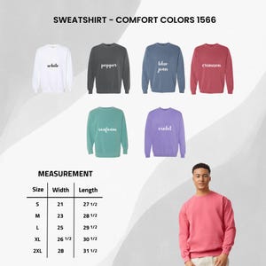 May include: A selection of Comfort Colors 1566 sweatshirts in various colors, including white, pepper, blue jean, crimson, seafoam, and violet. The image also displays a measurement chart with sizes ranging from S to 2XL, with width and length measurements in inches.