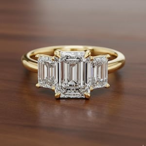 May include: A white ceramic mug with a black handle and the text "But First, Coffee" in a handwritten style. The mug is on a white surface. The mug is approximately 4 inches tall.