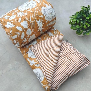 May include: A set of three ceramic mugs with a speckled, matte finish in cream, light grey, and dark grey. Each mug has a minimalist design and a rounded handle. Suitable for tea or coffee.