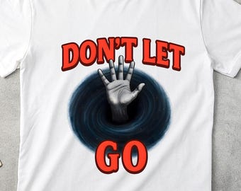 Don't Let Go hand reaching graphic Tee, Horror retro typography, vintage horror top, Halloween horror, tee, horror tee, scary movie tee.