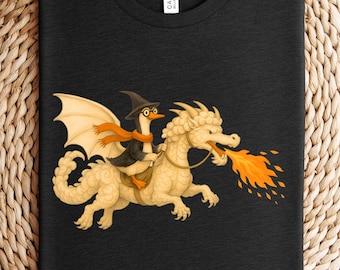 Witch Riding Fire-Breathing Dragon T-Shirt | Halloween Fantasy, witch dragon tee, dragon rider tee, mythical beast shirt, dark fantasy tee.