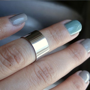 stainless steel knuckle ring, shiny cuff knuckle ring, wide knuckle ring, above the knuckle ring, midi ring, adjustable