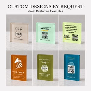 May include: Six rectangular acrylic blocks in various colors, including beige, light green, yellow, orange, olive, and blue. Each block features custom printed text, logos, and QR codes, showcasing examples of personalized designs for business use.