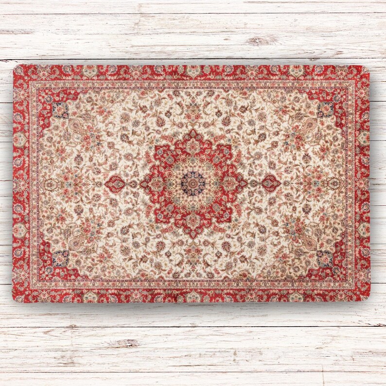 A rectangular Vintage Rug Dog Food Mat with a detailed floral pattern in red, cream, and brown. The rug has a central medallion design and a detailed border. The colour palette includes shades of red, cream, and brown, creating a classic, elegant look.