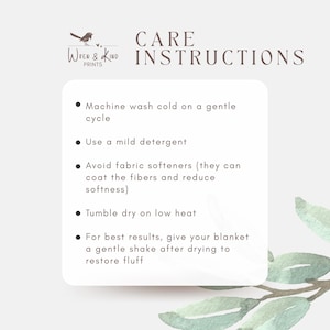 May include: A white card with care instructions for a blanket. The text includes washing instructions: machine wash cold, use mild detergent, avoid fabric softeners, tumble dry on low heat, and shake after drying.