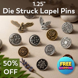 May include: A collection of die-struck lapel pins, each 1.25 inches in diameter, featuring various designs. The pins include an eagle, a rose, a moon and stars, and other geometric patterns. Some pins have a metallic finish, and some are on sale.