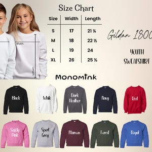May include: A youth sweatshirt size chart with measurements in inches. The chart includes sizes S, M, L, and XL, with corresponding width and length measurements. The image also displays various sweatshirt colors, including black, white, navy, and red.