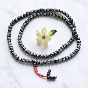 Yak Bone Tibetan 108 Bead Mala with Buddha of Compassion Mantra (Om Mani Padme Hum)