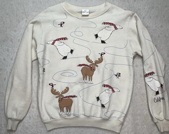 Sudadera vintage de los años 70 con estampado de alce de Alaska, talla mediana, para mujer, con dibujos animados de patinaje sobre hielo.