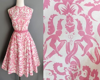 1950s winged cherub print dress, novelty print sundress, pink and white angels vintage