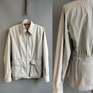 Giacca a vento da aviatore anni '40, in popeline di cotone grigio, con cerniera in ottone e cintura sul retro, taglia medio-grande, vintage anni '40, epoca Seconda Guerra Mondiale, unisex.
