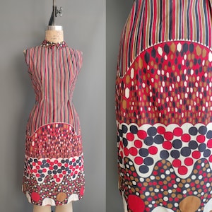 May include: A set of three ceramic mugs with a speckled, matte finish. The mugs are in shades of cream, light gray, and dark gray. Each mug has a simple, minimalist design, perfect for coffee or tea.