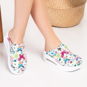 White Floral Butterfly Airmax Clogs – Orthopedic Work Shoes for Women in Clinics, Labs, Classrooms and Beauty Environments