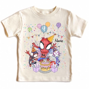 May include: Cream-colored t-shirt featuring a colorful Spider-Man birthday design. The graphic includes Spider-Man, Miles Morales, and Spider-Gwen, a cake, balloons, confetti, and the number 4. The word "Name" is also visible.