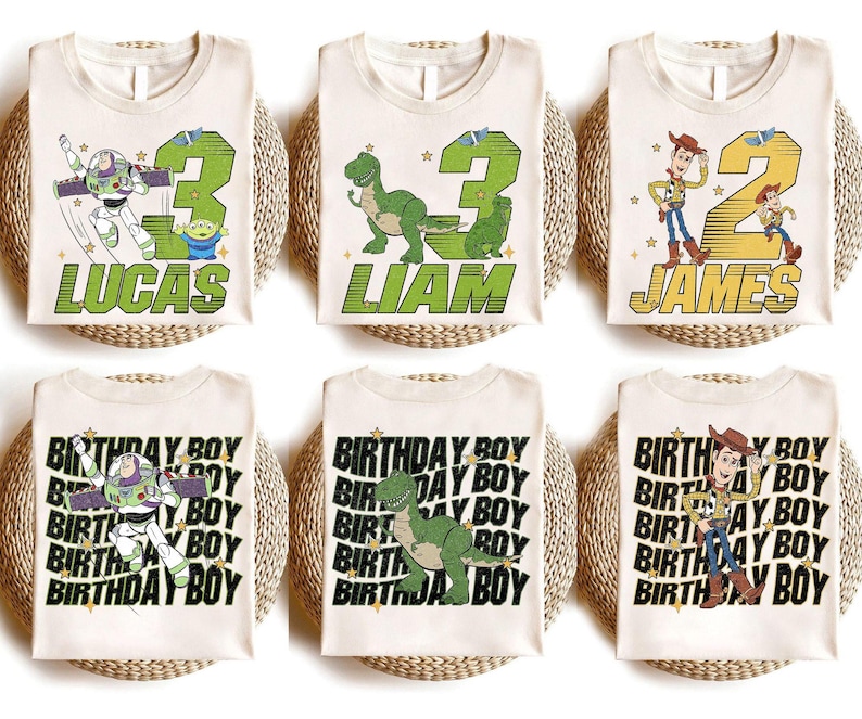 May include: Cream-colored t-shirts featuring Toy Story characters and names. Designs include Buzz Lightyear, Rex, and Woody with age numbers and names like Lucas, Liam, and James. Other shirts say "BIRTHDAY BOY".