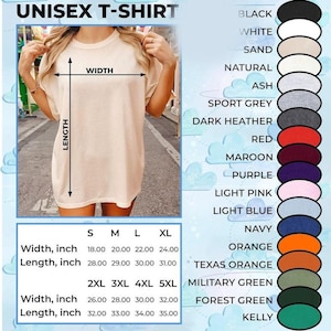 以下が含まれることがあります： ベージュ色のユニセックスTシャツが表示され、さまざまなサイズでインチ単位の測定値が示されています。カラーオプションには、黒、白、砂などがあります。シャツの幅は45.7〜81.3 cm、長さは71.1〜88.9 cmです。