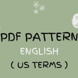 May include: A PDF pattern in English (US terms) is displayed on a sage green background. The text is in a mix of black and white fonts. Decorative elements include white flowers, scissors, and a "handmade" tag.