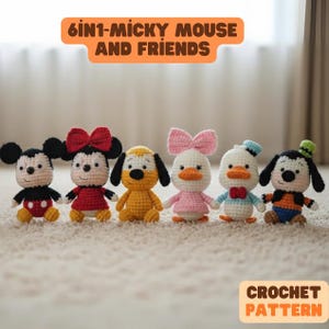 May include: A collection of six crocheted Disney character dolls, including Mickey Mouse, Minnie Mouse, Pluto, Daisy Duck, Donald Duck, and Goofy. Each doll is handmade with vibrant colors and detailed features. The image includes the text "6 in 1 - Mickey Mouse and Friends" and "Crochet Pattern."