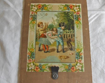 VICTORIAN KIDS At PLAY Antique Litho Print on Cardboard, Children Puppy Picket Fence Flower & Leaves Border 1890s Trunk Remnant 9.5 x 14