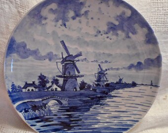 BLUE WINDMILLS & CANAL Plate Hand Painted Rustic Cottages Stone Bridge Scene Clouds Sea Gulls Vintage 9" d Signed Holland Delft Wall Decor