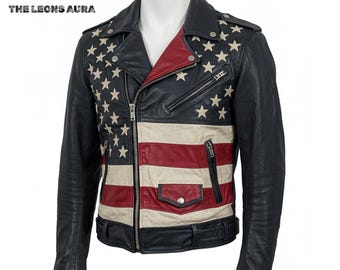 May include: Black leather jacket with an American flag design. The jacket features white stars on the shoulders and upper sleeves, with red and white stripes on the front. It has a zipper closure, pockets, and a belt.