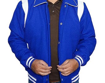 May include: A royal blue varsity jacket with white accents on the shoulders, collar, and cuffs. The jacket has a button-up front and a classic design. The Leons Aura logo is visible in the top left corner.