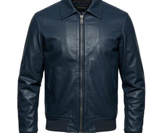 May include: A navy blue leather jacket with a collared neckline and a full-length zipper. The jacket features ribbed cuffs and hem, and a classic bomber jacket design. The leather has a slightly textured appearance.