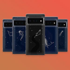 May include: A collection of phone cases with marine life designs. Each case features a different sea creature, including a manta ray, whale, and squid, set against a starry night sky. The cases are in shades of navy blue and black.