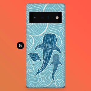 May include: A phone case featuring a blue and white ocean-themed design. The case has a pattern of swirling waves and three stylized marine animals: a whale shark, a manta ray, and a smaller whale shark. The case is designed for a smartphone.