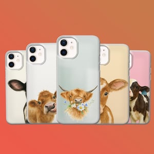 May include: A collection of phone cases featuring watercolor illustrations of cows. The cases showcase different cow breeds, including a Highland cow with flowers, and a black and white cow. The cases have a clear border and a solid color background.