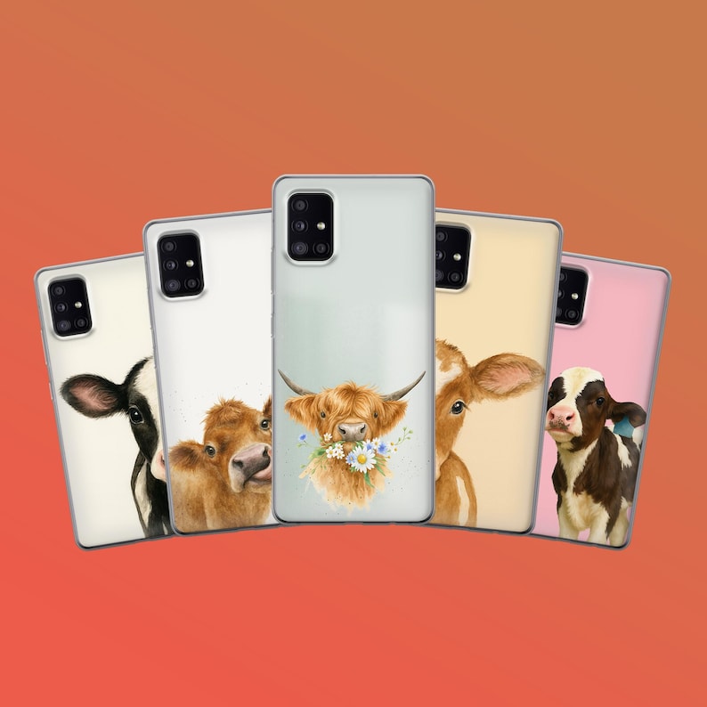 May include: Five phone cases with cow illustrations. The cases feature different cow breeds and designs, including a Highland cow with flowers, and a black and white cow. The cases are set against a gradient orange background.