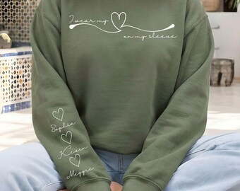 I Wear My Heart On My Sleeve Sweatshirt, Custom Name Sleeve Sweatshirt, Personalized Mom Gift Sweatshirt
