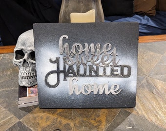 Home, Sweet Haunted Home sign