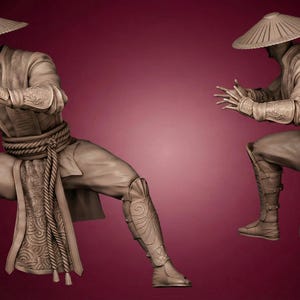 May include: Two statues of a figure in a martial arts pose, wearing a wide-brimmed hat, tunic, and boots. The figure is in a fighting stance with hands outstretched. The statues are a neutral color against a burgundy background.
