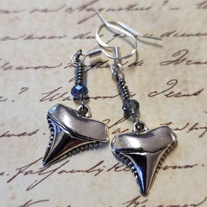 Shark Tooth Dangle Earrings with Blue Faceted Glass Bead